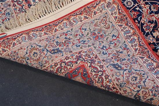 A fine Tabriz blue ground rug, 7ft 10in by 4ft 10in.